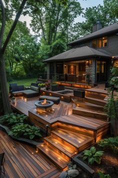 an outdoor deck with steps and fire pit