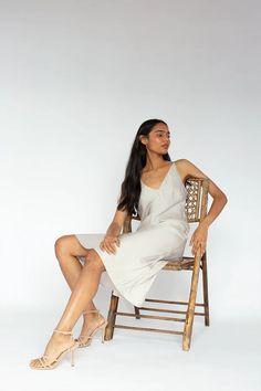 Cut on the bias for a figure-flattering drape that hugs your curves, this strappy slip dress is made in a luxuriously soft, lightweight and eco-friendly TENCEL™. Layer it over a turtleneck while it's still cold, then wear it with sandals and a jean jacket once the weather warms up. IMPACT & CARE Made with Tencel Modal Manufactured in family run factories in India that pay fair wages & provide medical care Non-toxic, AZO free dyes Machine wash cold or up to 86° F / 30° C Hang dry or tumble low he Boyfriend Shirt Dress, Dresses 2020, Silk Slip Dress, French Seam, Boyfriend Shirt, Silk Slip, Built In Wardrobe, Silver Dress, Luxury Fabrics