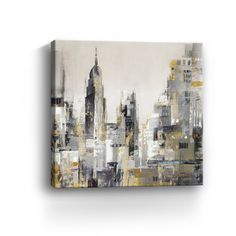 an abstract cityscape with buildings painted on it's sides in yellow, grey and white