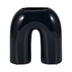 a black vase shaped like the letter n