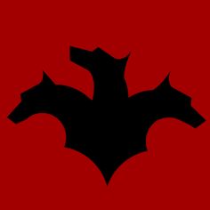 the silhouette of a bat on a red background