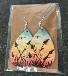 Wood burning done by hand. Wood Burning Earrings Diy, Wood Burned Earrings, Hand Painted Earrings Wood, Hand Painted Earrings, Laser Engraved Ideas, Painted Rocks Diy, Wooden Earrings, Diy Earrings, Painted Rocks