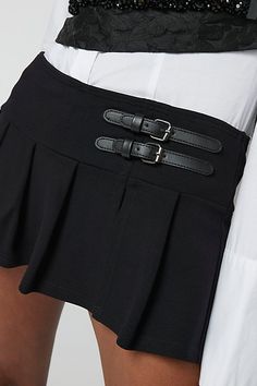 Micro mini skort from UO in a kilt-inspired design. Cut short in a low-rise with hidden shorts underneath. Complete with pleats throughout and buckle detailing at the side. Find it exclusively at Urban Outfitters. Features Kilt-style UO skort Low-rise style in a micro mini length Hidden shorts underneath UO exclusive Content + Care 72% Viscose, 25% nylon, 3% spandex Machine wash Imported Size + Fit Model in Black is 5’9" and wearing size Small Measurements taken from size Small Length: 13.5" | Urban Outfitters UO Pleated Kilt Micro Mini Skort in Black, Women's at Urban Outfitters Kilt Style, Urban Outfitters Skirt, Skirt Shorts, Micro Mini, Ethereal Art, Kilt, Black Fits, Low Rise, Mini Skirt