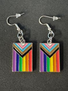 Pride Earrings! Love is Love 🏳️️⚧️ ! Can also be made into clip on earrings just message us ! Customs are available message us for details! (Bin C2) Lgbtq Earrings, Rainbow Flag, Pride Flags, Clip On Earrings, Selling On Etsy, Etsy App, Sell On Etsy, Jewelry Earrings Dangle, Flag