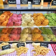 there are many different types of pasta on display