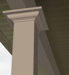 an image of a white pillar on the side of a building