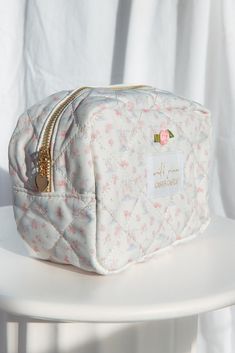 Exclusive castle pattern cosmetic bag. It is quilted and lined with a “made of magic” pink print, and features a heart zipper pull. Can be used a travel bag, makeup bag, tech bag, skincare bag, and so much more.Size: 8” x 6” x 4”100% Nylon *Final sale / not eligible for discounts Quilted Pouch Cosmetic Bag Gift, Quilted Cosmetic Pouch Bag As Gift, Quilted Pouch Cosmetic Bag As Gift, Quilted Pouch Cosmetic Bag, Cute Cosmetic Zipper Pouch For Storage, Cute Cosmetic Bag With Zipper For Storage, Cute Cosmetic Bag With Zipper Closure For Personal Use, Cute Travel Pouch With Zipper Closure, Skincare Bag