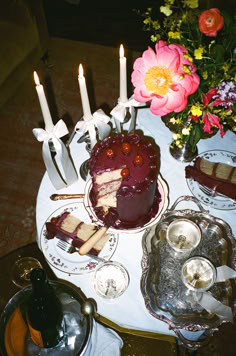 there is a cake on the table with candles