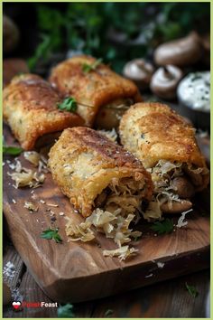 some food is laying out on a cutting board with mushrooms and parmesan cheese