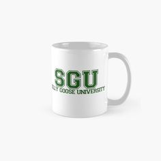 a white coffee mug with the words sgu on it and green lettering in black