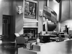 an old black and white photo of a living room