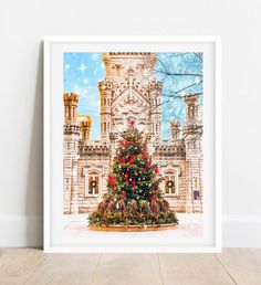 a christmas tree in front of a castle