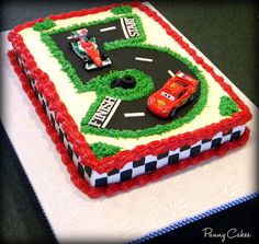 a birthday cake with cars on it