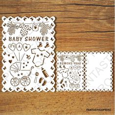 two paper cutouts with baby shower designs on them, one is white and the other has