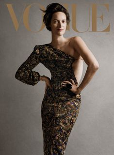 a woman in a dress on the cover of a magazine with her hands on her hips