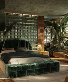 a bedroom with a large bed and lots of plants in the room on either side