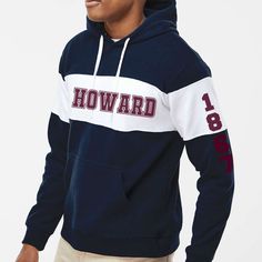 "Custom & Vintage Howard U HBCU College Apparel, Graphic Tees, Hoodies, Sweatshirts, and More Howard Univ Apparel For Both Howard Students and Howard Alumni. Black owned, HBCU alumni operated apparel company specializing in academic wear. This Howard U product is handmade in Atlanta, GA with materials purchased from local Atlanta vendors. We use only the best material, printing, and packaging. Orders typically ship much faster than posted timeframes.  Color Block Hoodie Specific Details/Specifications 8 oz./yd², 60/40 cotton/polyester sueded fleece Double-needle stitched throughout Three-piece jersey lined, contrast-color hood with sewn eyelets and contrast-color drawcord Contrast-color self-fabric panels on chest and arms Contrast twill tape at back of neck Side seams Set-in pouch pocket Collegiate White Crew Neck Hoodie, White Collegiate Hoodie With Crew Neck, Collegiate White Sweatshirt With Drawstring Hood, White Hoodie For College School Spirit, White Collegiate Crew Neck Hoodie, White Collegiate Sweatshirt With Drawstring Hood, White Hooded Sweatshirt For School Spirit, White Long Sleeve Hoodie For School Spirit, Sporty Pre-shrunk Hooded Tops