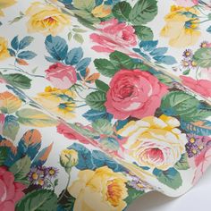 an image of a flowered fabric that is very colorful and has many flowers on it