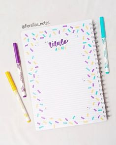 a notepad with the word rinde written on it next to two pens