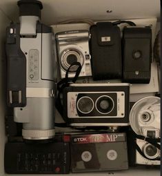 there are many different cameras in the box and one is on top of each other