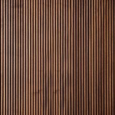 a close up view of the wood grains on this wallpapered paneling