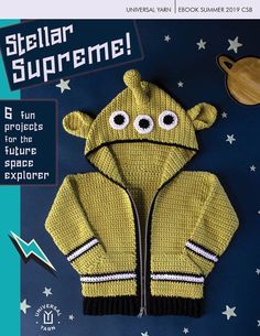 a knitted jacket with googly eyes and stars on the back, in front of an outer space background