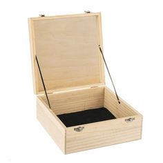 an open wooden box with two handles and black linings on the inside, sitting in front of a white background