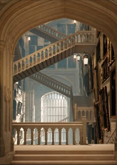 an arch leading into a building with stairs