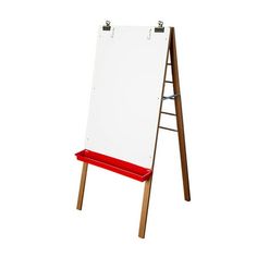 a wooden easel with a white board on it's legs and red seat