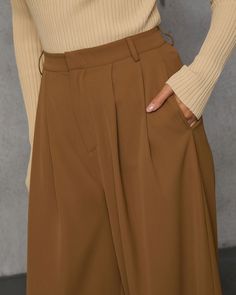 Trendy babes will love the Madrigal Pocketed Wide Leg Pants that goes with everything and features a relaxed, wide leg fit. It's an elevated and versatile basic that belongs at the center of your capsule wardrobe. High rise Wide pant leg Pocketed Front zip fly and hook closure Not lined 100% Polyester Sleeveless Cardigan, Swimwear Bottoms, Wide Pants, Wrap Sweater, New Tops, Long Sweaters, Hat Hairstyles, Western Wear, Sweater Accessories