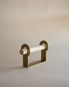 a white and gold object sitting on top of a table