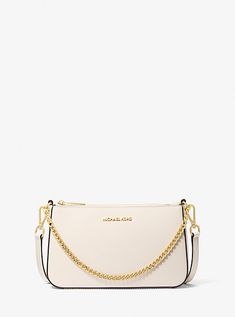 Find MICHAEL KORS Jet Set Saffiano Leather Crossbody Bag on Editorialist. The Michael Kors Jet Set crossbody bag features a compact silhouette and a removable shoulder strap. This structured bag is crafted from saffiano leather and features a gold tone chain strap. It can be worn crossbody or on the shoulder. The bag has a zip closure and an interior slip pocket. It is perfect for carrying everyday essentials. Crossover Bags, Structured Bag, Michael Kors Shoulder Bag, Curated Closet, Statement Bag, Dream Bags, Michael Kors Collection, Handbags Michael Kors, Kors Jet Set