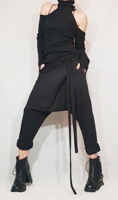 "Loose Harem Pants, Harem Women Trousers, Black Loose Pants ❤️ Extravagant designs and high quality fabrics! ❤️ Materials & Care Textile, Polyamide, Cotton Polyester Hand wash at low temperatures. Do not machine dry. Do not iron. Do not dry clean! ❤️ Sizing We can make your piece from XS to 5XL! Everything in the shop can be also made according to your measures free of charge! ❤️ Shipping ✈ Ready to ship The time I need to prepare an order for shipping varies. For details, see individual ite Fantasy Pants, Black Loose Pants, Vestiti In Jeans, Magic Pants, Black Trousers Women, Gothic Pants, Women Trousers, Drop Crotch Pants, Harem Pants Women