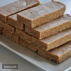 there are several pieces of food on the plate and one is cut in half to look like squares