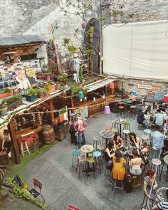 an overhead view of people sitting at outdoor tables