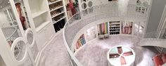 an aerial view of the inside of a shoe store with high ceilings and lots of shelves