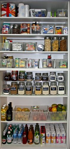 a pantry filled with lots of food and condiments on top of white shelves