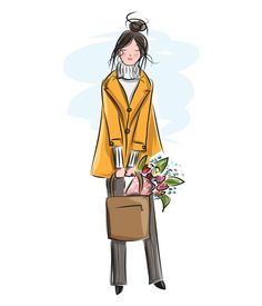 a woman in a yellow coat and brown bag with flowers on the side, she is holding