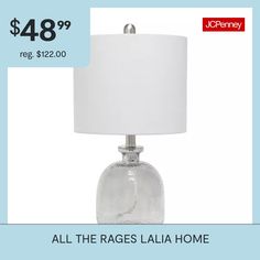 a table lamp with a price tag for $ 48 99 reg $ 120 00 all the rages laia home