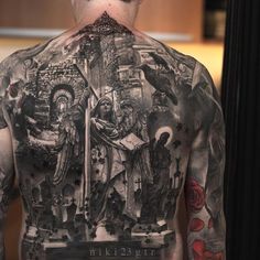 the back of a man with tattoos on his body