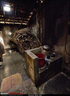 there is a fire escape in the basement with buckets and an open fire hydrant