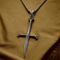 Silver Fantasy Elven Sword, Broken Blade Necklace Birthday Gift For Him Christmas Present Medieval Jewelry Mens, Womens Pendant ✦ Jewelry Details ✦ * Pendant Length: 2.66 Inches / 6.7 cm / 67 mm * Pendant Width: 1.31 Inches / 3.4 Cm / 34 mm * Weight: 7.5-8.5 grams * Finish: Oxidized * Material: 925 Sterling Silver * Stamp: 925 * Chain Thickness: 1.40mm / 0.06 Inches / 0.14 cm * Chain Weight: 18 Inches, 4,55 Grams 20 Inches, 5,10 Grams 22 Inches,  5,60 Grams 24 Inches, 6,00 Grams 26 Inches, 6,75 Blade Necklace, Broken Blade, Jewellery For Men, Cheap Necklaces, Jewelry Mens, Medieval Jewelry, Chocker Necklace, Boho Choker, Gold Long Necklace