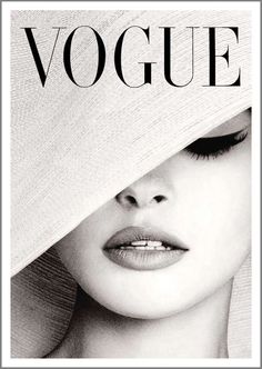 the front cover of a magazine with a woman's face covered by a hat