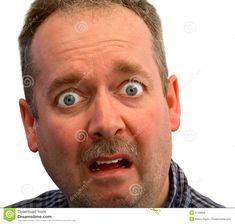 a man making a surprised face with his eyes wide open stock photo - image 4597