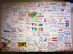 a bulletin board with many different words and phrases on it, all written in rainbow colors