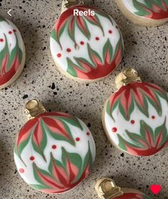 decorated christmas ornaments sitting on top of a table