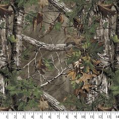 an image of a camouflage background with trees and leaves