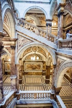 the inside of an old building with marble stairs