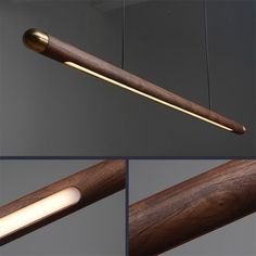 the light fixture is made out of wood and has a metal rod with a wooden handle