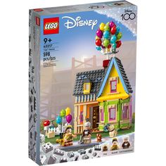 the lego disney house has balloons on it's roof and is ready to be put in